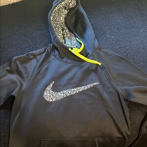 Nike Black Jacket with Iconic Swoosh and Neon Accents